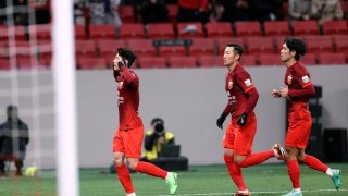 梅开二度捂耳庆祝回击质疑 武磊激情滑跪释放压力